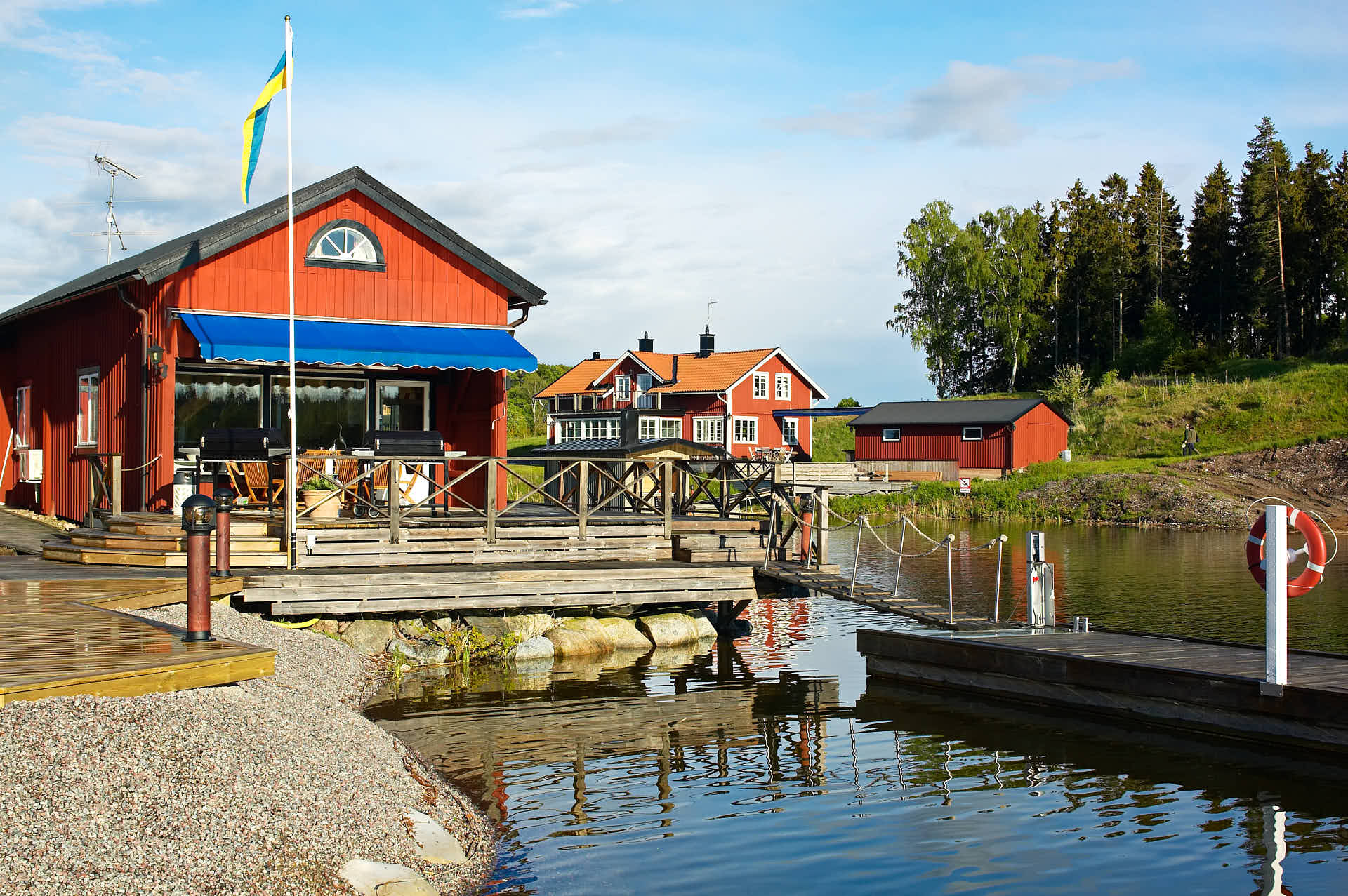 Thoresta Herrgård. Båthuset i solnedgång. Foto Martin Ekwall.